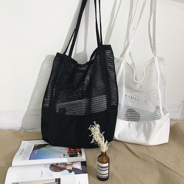 

women's hollow shoulder bag 2020 summer new korean soft mesh black handbag canvas mesh white beach bag