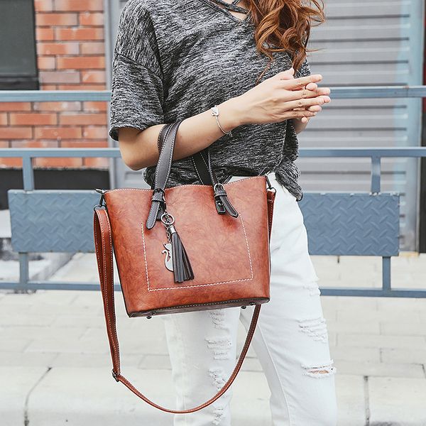 

2020 new style bucket bag simple hand pu handbag crossbody bag women's shoulder