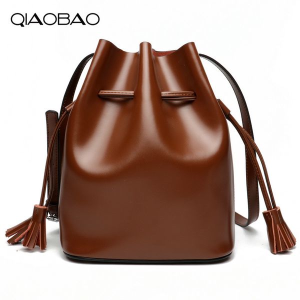 

qiaobao drawstring bucket bag women genuine leather handbag female shoulder crossbody bag with tassel ladies brand tote