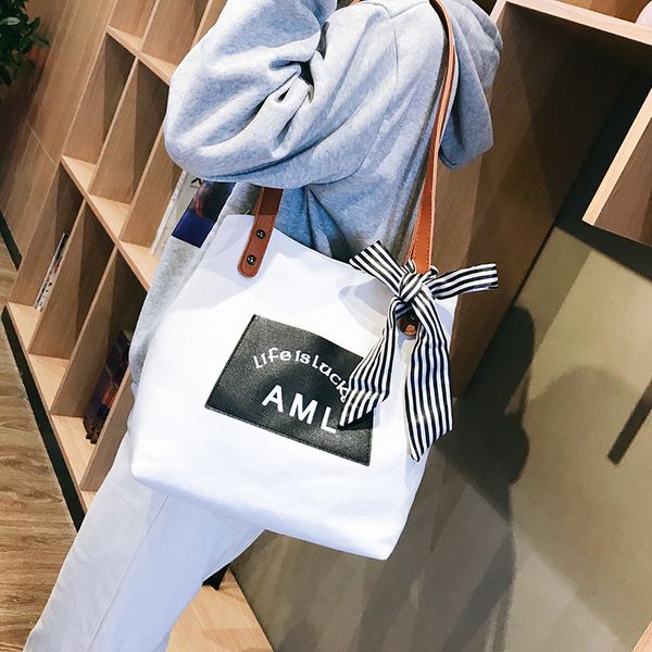 

women's 2020 new style vintage sense girl's canvas bag large capacity hand shopping bag bow shoulder