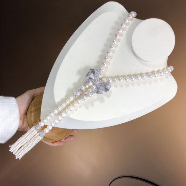 

100% natural white 8-9mm freshwater cultured pearl hand knotted micro inlay zircon bowknot pendant sweater necklace 36inch, Silver