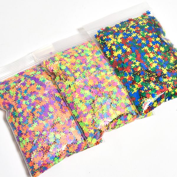 

neon puzzle- shaped glitter multi color neon puzzle pieces, .50g weighed bags,4 mm solvent resistant non-toxic polyester glitter, Silver;gold