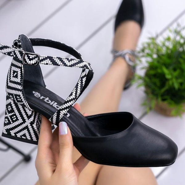 

londa black skin rugs shoes in detail