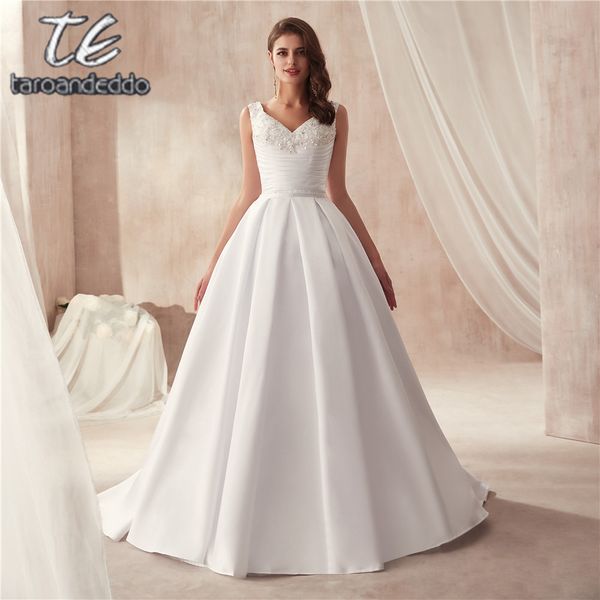 Zweiteiliges Brautkleid aus mattem Satin mit V-Ausschnitt und berühmtem Design mit Tasche, Brautkleid mit abnehmbarem Rock. Brautkleider mit V-Ausschnitt