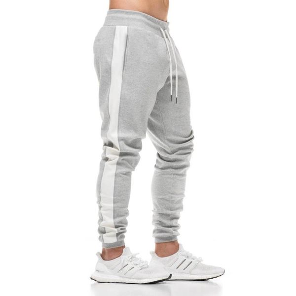 

Muscle Men sportswear fitness Pants Casual Elastic cotton Mens Fitness Workout Pants skinny Sweatpants Trousers Jogger