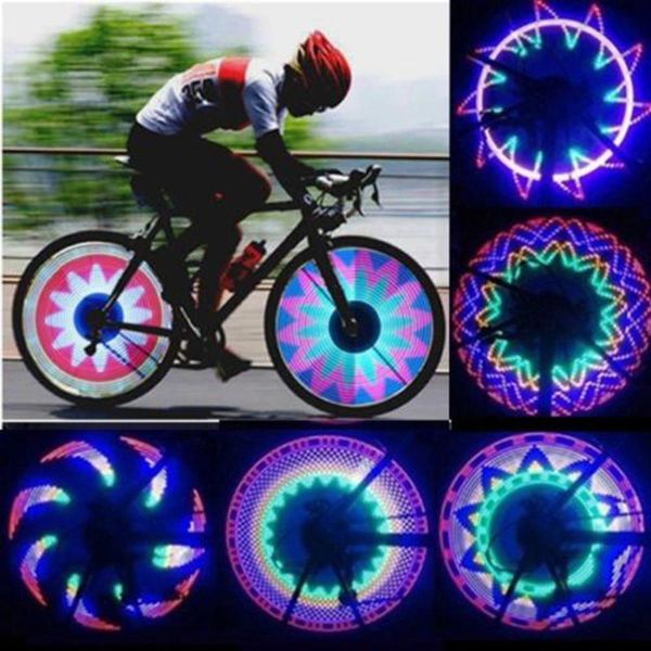 Nuovo 2 Side 32 LED 32 Modalità Notte Impermeabile Lampada di segnalazione ruota Cerchio riflettente Arcobaleno Pneumatico Bici Bicicletta Raggio fisso Avvisa luce