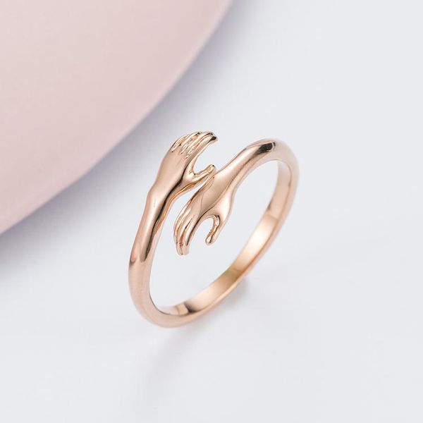 

korean version of romantic love hug rose gold titanium steel ring hands embrace valentine s day gift trend jewelry wholesale postage, Silver