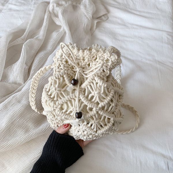 

hollow out woven women's shoulder bags drawstring bucket bag handbags for women 2020 new casual crossbody bag beach travel bags