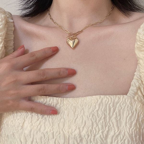 

aomu 2020 vintage fashion heart pendant ot buckle necklace gold silver color simple clavbone chain for women jewelry gift party