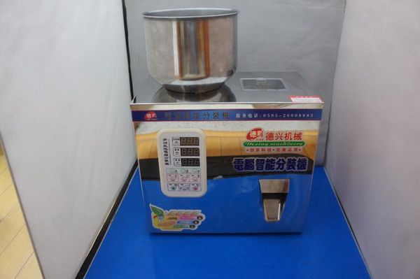 

1-25g automatic weighing packing machine granular hardware nut materials filling machine granular material version