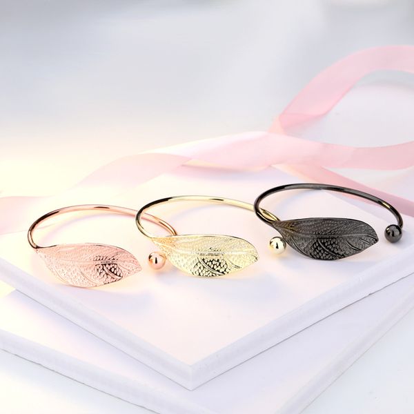 

women opening bracelet plant leaf, Black