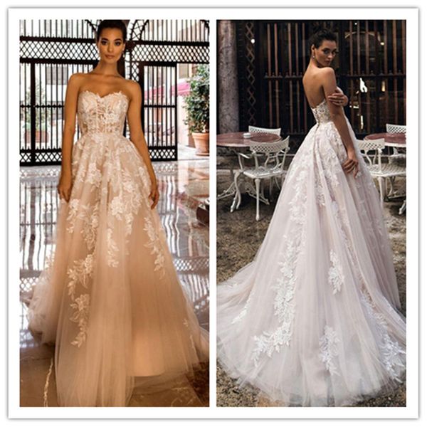 

2020 vintage champagne wedding dresses a line boho elegant lace appliques sleeveless brdial gowns beach lacing wedding party dresses, White