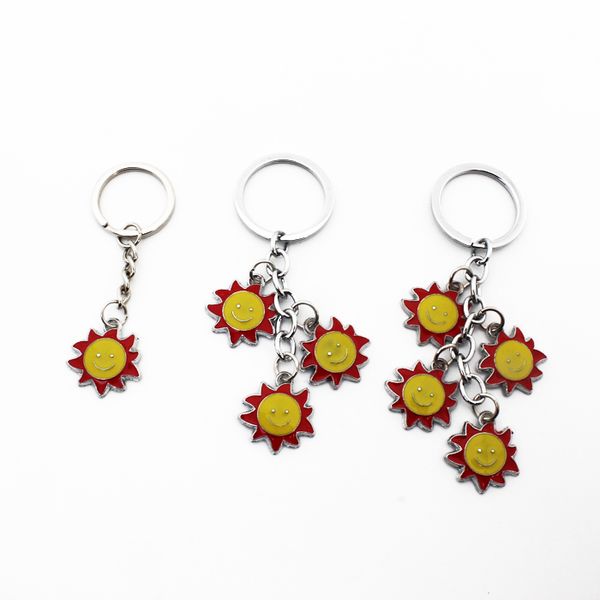 

by dhl 100pcs/lot new creative metal smiling sun keychains zinc alloy sun shaped keyrings for gifts, Silver