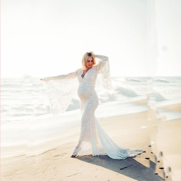

2020 white deep v-neck flared sleeve lace perspective tight-fitting tail dress 1943