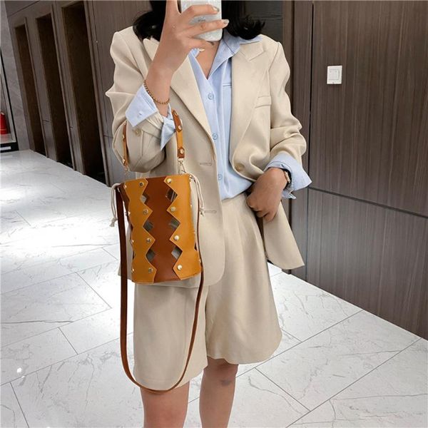 

fashion rivet women bucket shoulder bags hollow leather messenger tote handbag female classic elegant shoulder handbags