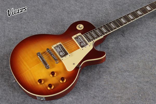 

custom shop,electric guitar,sunburst color tiger flame with chrome hardware gitaar.cream pickguard.one piece neck and body