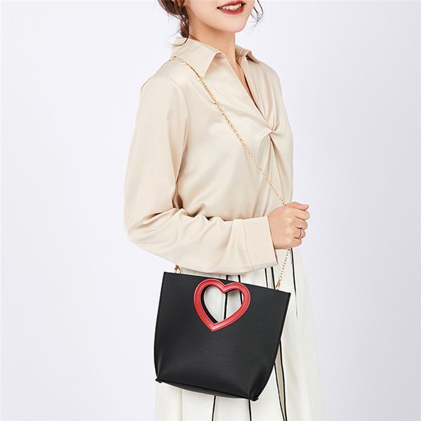 

2020 новый портативный цепной любовь ковш сумка мода girl кожа pu одно плечо крест малый сумка сумки