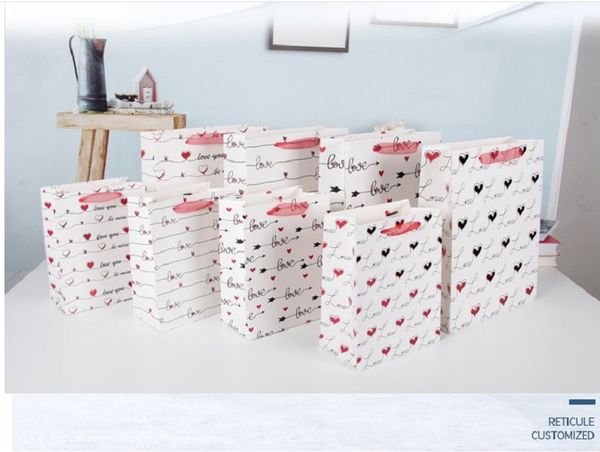 

2020 small fresh clothes shopping bag white cardboard portable paper bag general gift bag