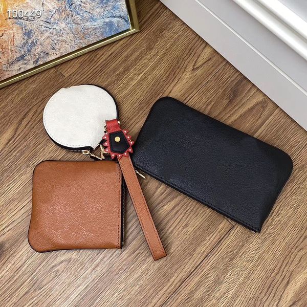 

nice quality classic empreinte leather pouches in different sizes and color carried by wristlet together or attached to bag belt separately