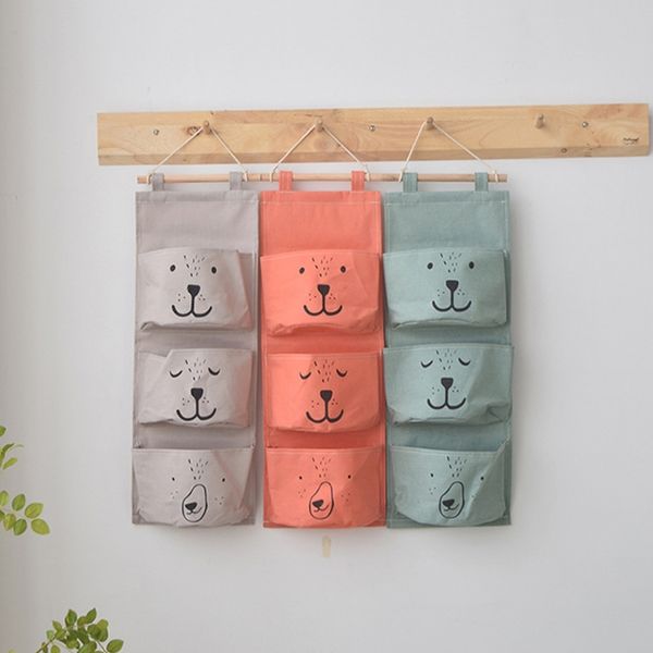 

multi storey linen hanging bag waterproof 3 pockets cartoon face storage bag lx9c
