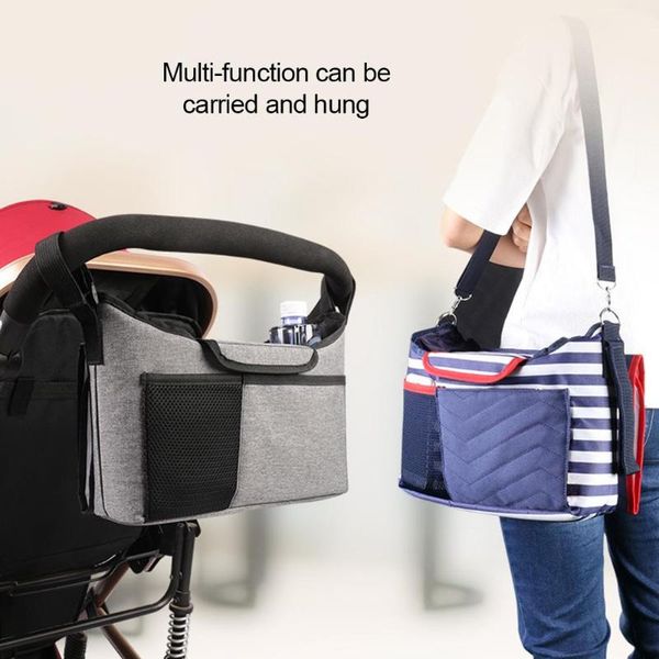 

baby mummy bag child stroller hanging baby storage bag with diaper pad stroller