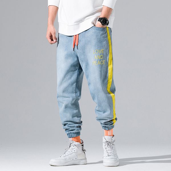 

fashion streetwear men jeans blue color denim harem pants hombre yellow stripe spliced japanese style hip hop joggers jeans men
