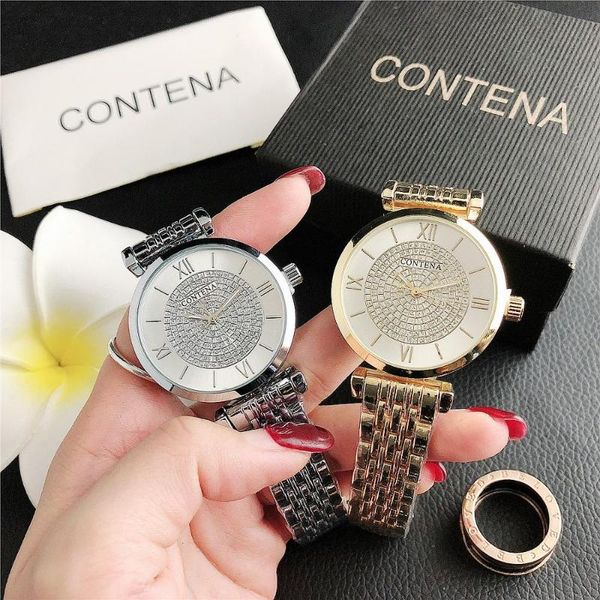 

women's watch with roman numerals and diamonds, Slivery;brown