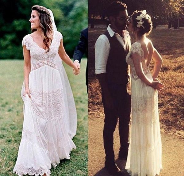 

2021 boho wedding dresses a line backless scalloped v neckline lace floor length short cap sleeves beach wedding gown vestido de novia, White