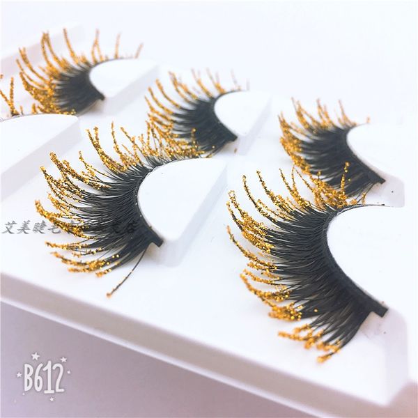 

false eyelashes dense exaggerated walk show nightclub stage makeup smoked