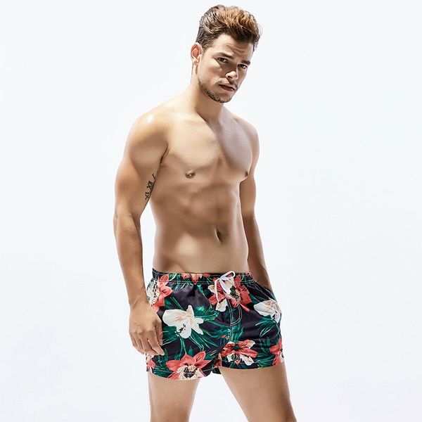 

new design mens beach shorts gay swimsuit swimwear polyester surfing shorts flowers printed swim trunks loose board men's clothing, White;black