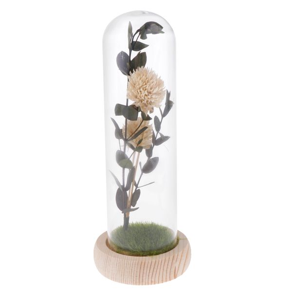 

artificial flowers in glass dome on a wooden base for home decor