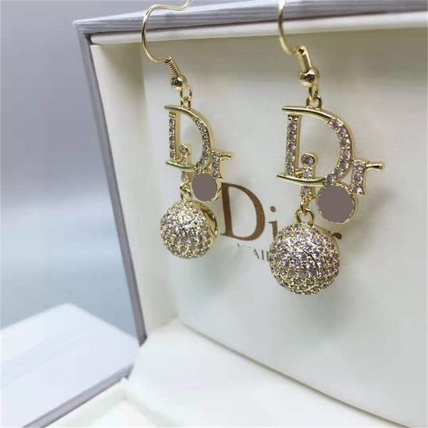 

87% off wholesale shop family earrings female new diamond inlaid hollow out ball stereo spherical earrings personalized ear hook, Golden