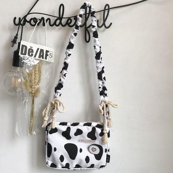 

cross body korean versatile cow print canvas shoulder bag women's 2021 girl's schoolbag cute cartoon messenger