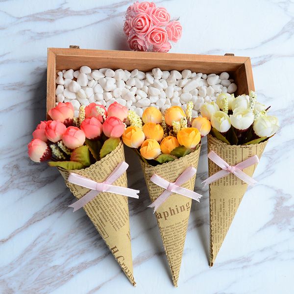 

mini red rose handmade newspaper flower ornaments pgraphy background pgraphy props artificial flowers t3i51711