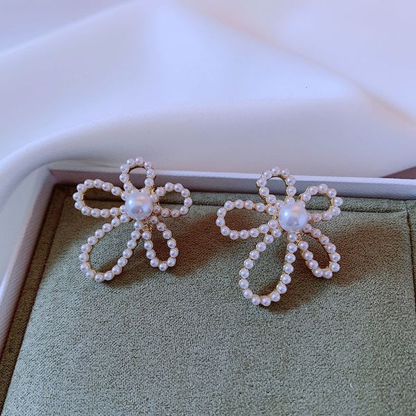 

same flower earrings in dongdamen, south korea the, Silver