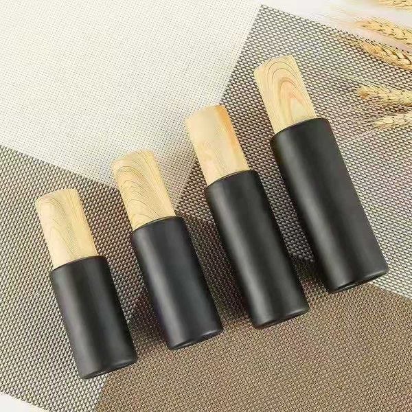 

empty glass pump bottles refillable black frosted glass lotion essential oil spray bottle with woodgrain plastic cap 20ml - 80ml 64 g2