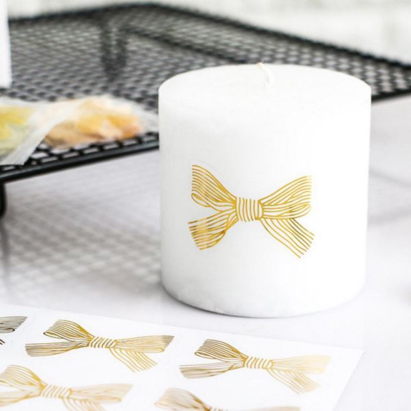 

60pcs lot cute golden big bow sticker gold handmade adhesive cake sweet candy packaging sealing label sticker gift stationery yxllco jjxh