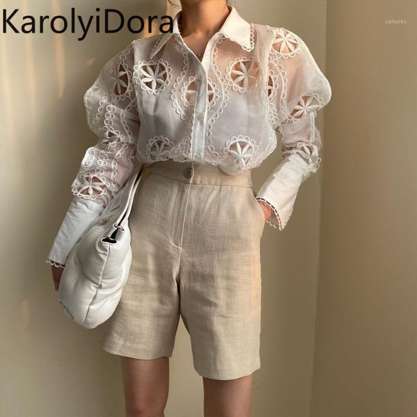 

hollow out floral embroidery temperament shirt women see through long sleeve loose white blouse 2020 trend1