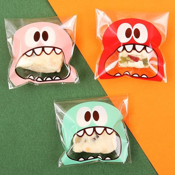 

100pcs plastic bags cute big mouth monster transparent candy cookie bag self-adhesive for wedding birthday party gift opp packin