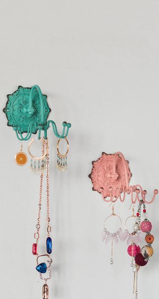 

retro handcrafted iron rotating rustic wall hooks