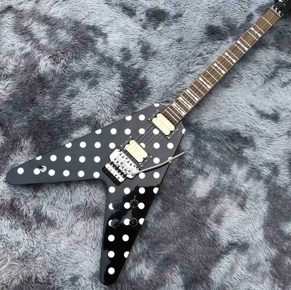 

custom electric guitar in black and white spot 2021 new guitar with rocker vibrato system