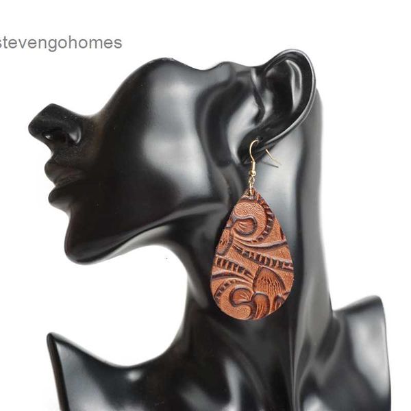 

high creative embossed leather are popular with quality earrings, Golden