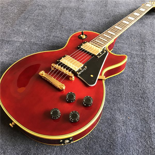 

new arrival red electric guitar with yellwo binding , gold color hardware , some countries ing