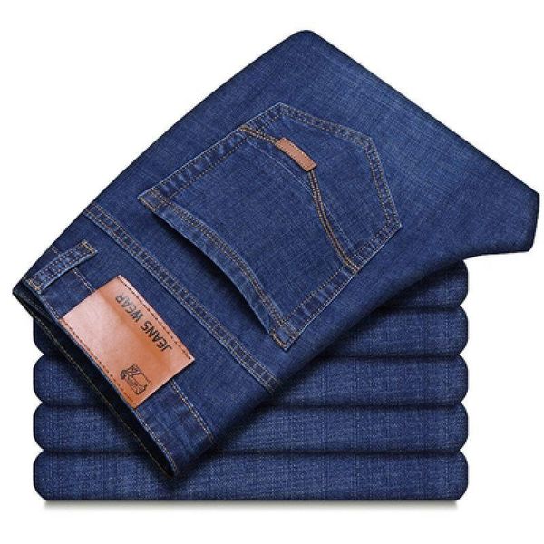 

new thickened elastic and breathable men's jeans work pants in fall / winter 2020, Blue