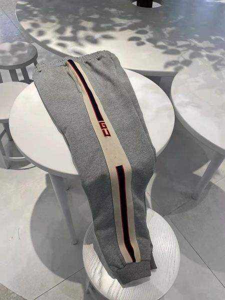 

fashion brand 2020 new gu family men and women lovers side ribbon letter casual pants, White