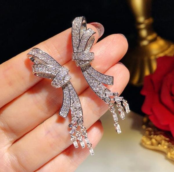 

sterling silver luxury shining fashion bow designer earrings long tassel dangle earrings jewelry with crystal cz diamond for women wedding, Golden;silver