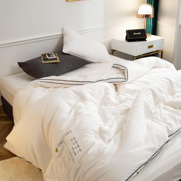 

home bed in autumn and winter by l solid color single and double core, soybean fiber is thickened to keep warm against skin