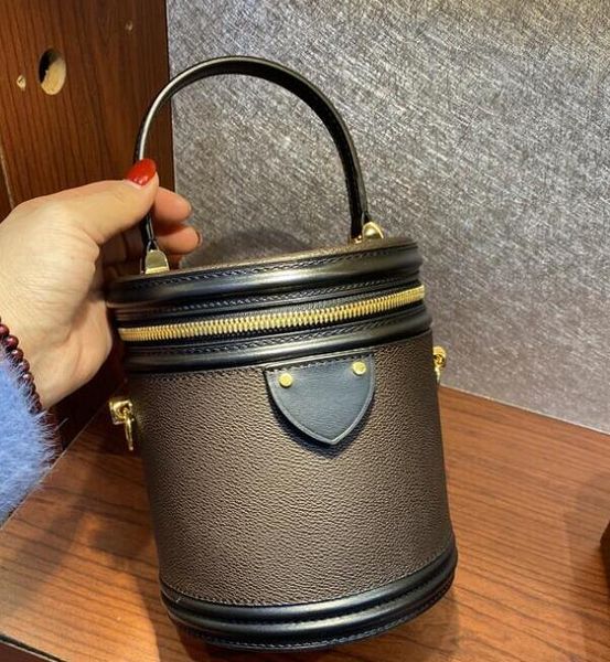 

2020 cosmetic bags beauty case reverse coated canvas petite size crossbody removable strap drum shoulder bag one handle cylinder mini bag