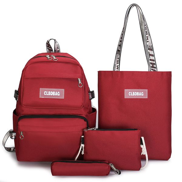 

backpack korean version of the new economical large-capacity four-piece junior high school and primary student canvas backpack schoolbag