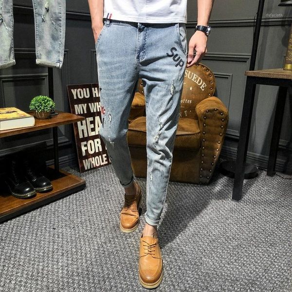 

nice spring korean version of the campus wind couple loose text printing casual trend small hole stretch jeans party1, Blue